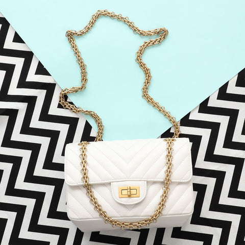 Chanel Mini White Chevron-Quilted Aged Calfskin Reissue 2.55