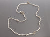 Chanel Long Pearl and Crystal Logo Necklace