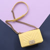 Chanel Small Yellow Chevron-Quilted Caviar Boy Bag