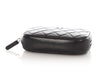 Chanel Small Black Lambskin Curvy Cosmetic Case